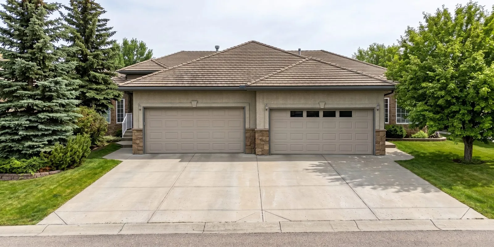 Illustration of a typical Calgary bungalow villa: one level, an attached garage, and grounds the condo corporation looks after